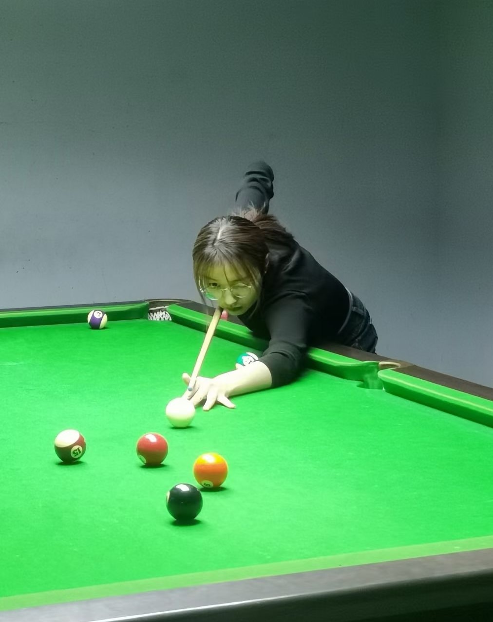 Me practicing my billiard skills